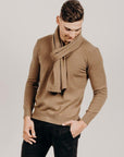 Man wearing a light brown Classic Cervelt Scarf and sweater - Kapeka NZ, Made from New Zealand Red Deer Fibre. Very Soft and rare Fibre. Only made in New Zealand