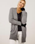 Woman wearing a Merinosilk Lakeside Sweater and cardigan - Kapeka NZ