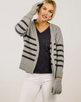 Woman wearing a Merinosilk Lakeside Sweater and cardigan - Kapeka NZ
