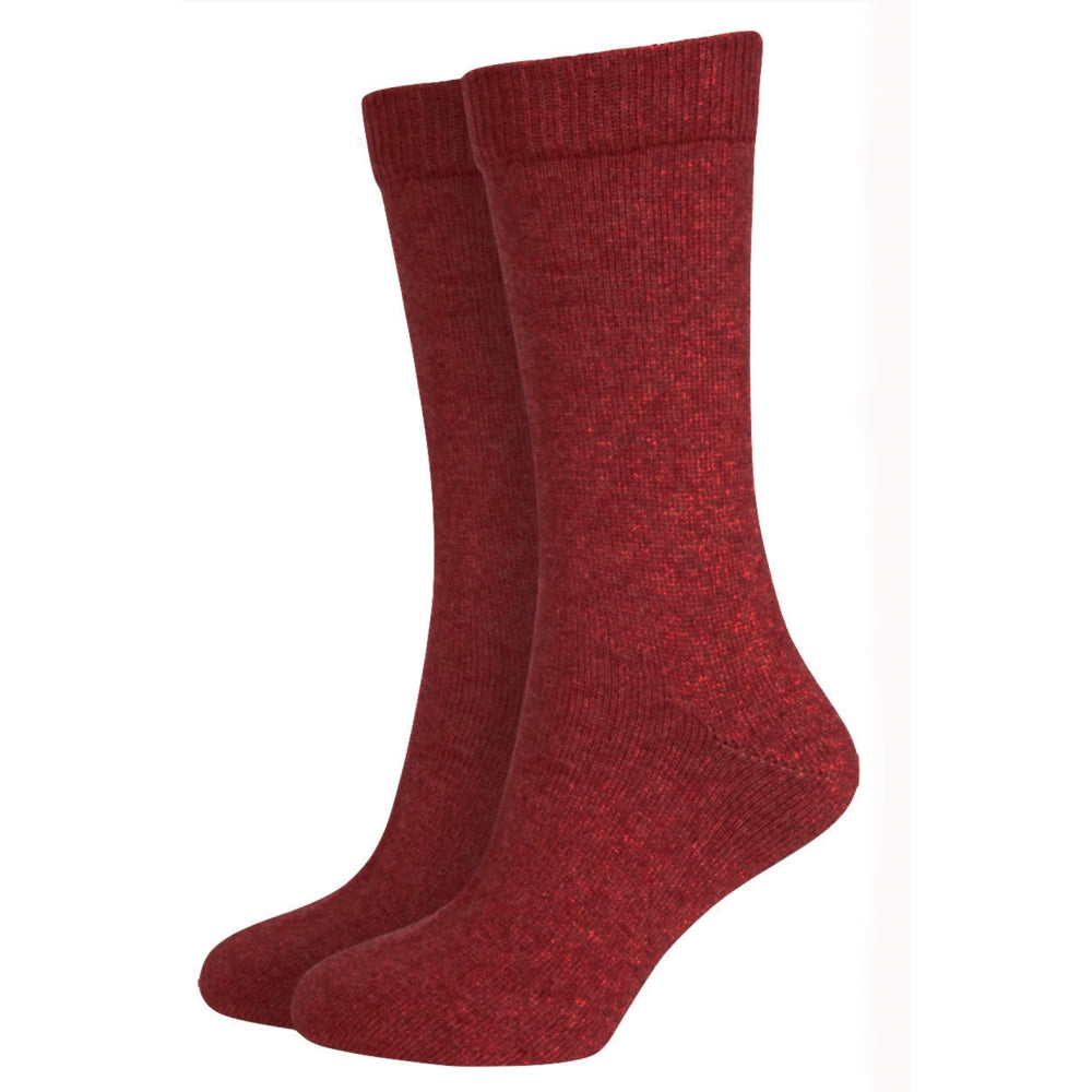 Pair of red socks on a white background