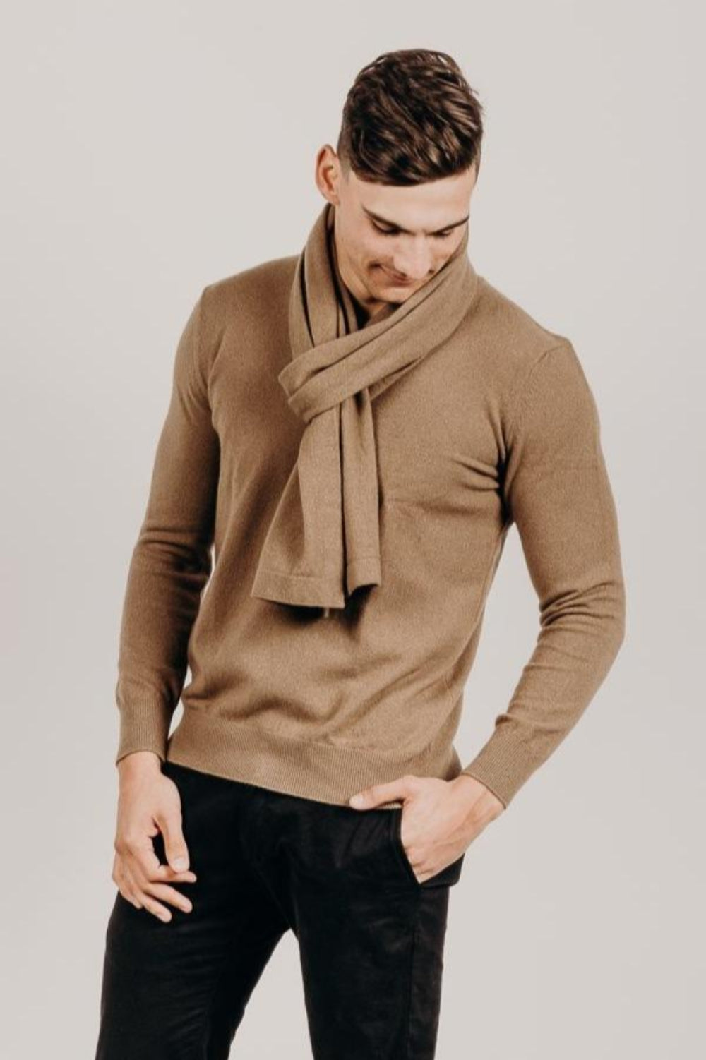 Man wearing a Cervelt Stole - Luxury at its finest. 100% Made in New Zealand. New Zealand Red Deer fibre.