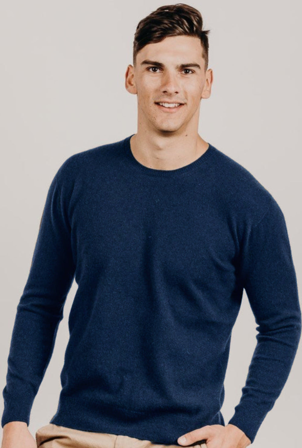 Man wearing a navy sweater